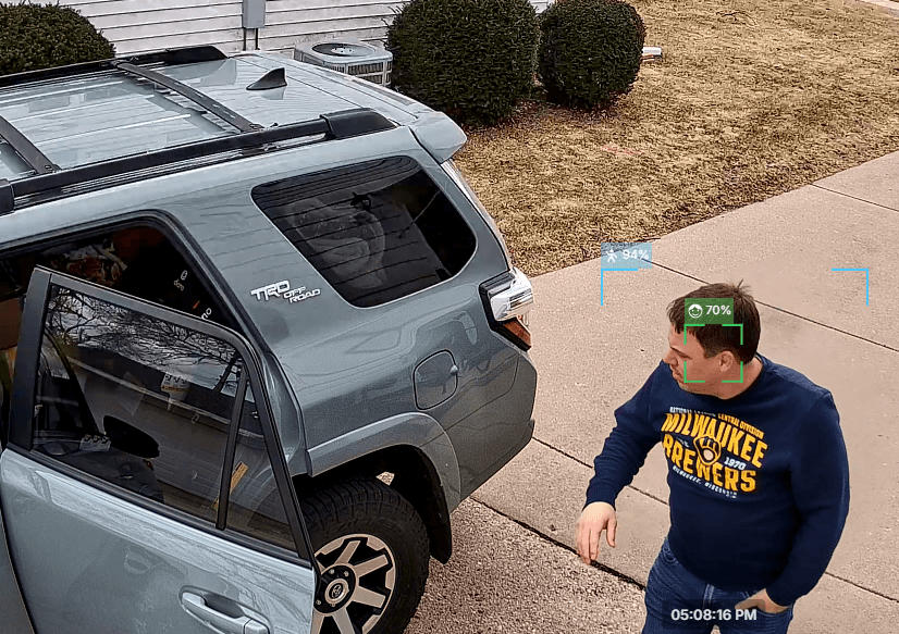 4K event recording with facial recognition captured near a parked vehicle