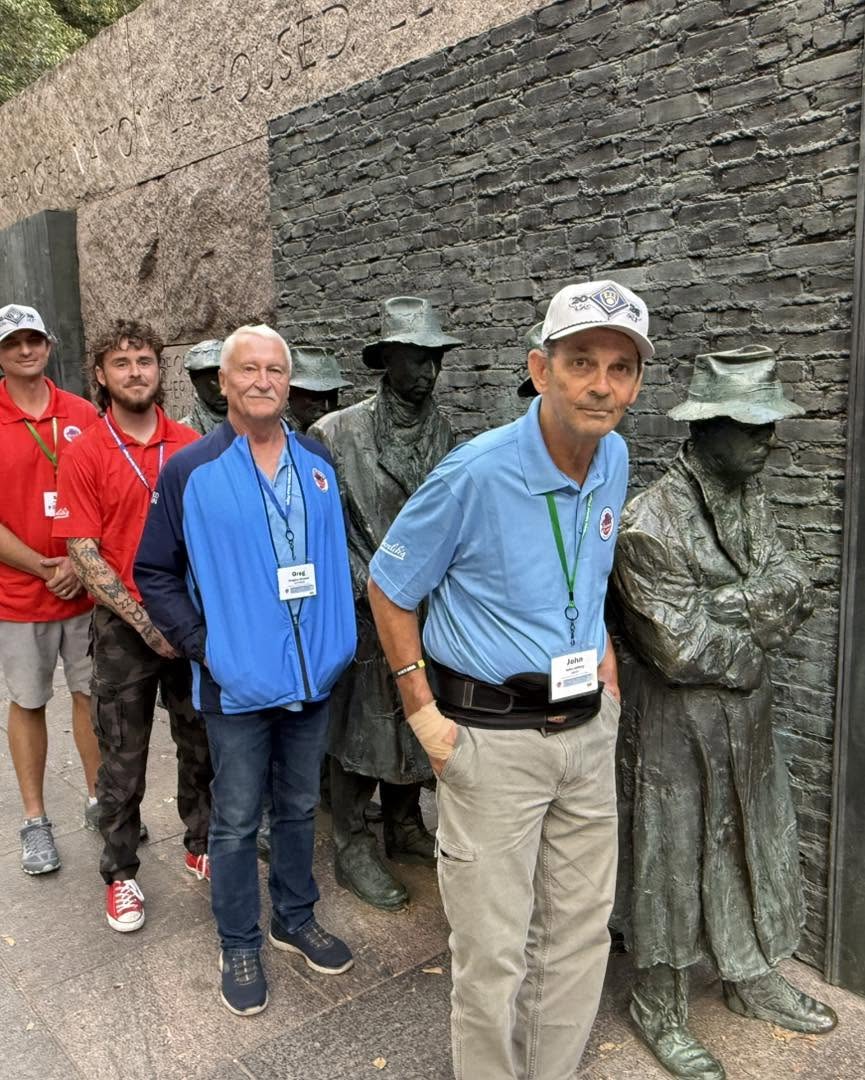 A visit to the memorial’s Depression-era breadline sculpture.