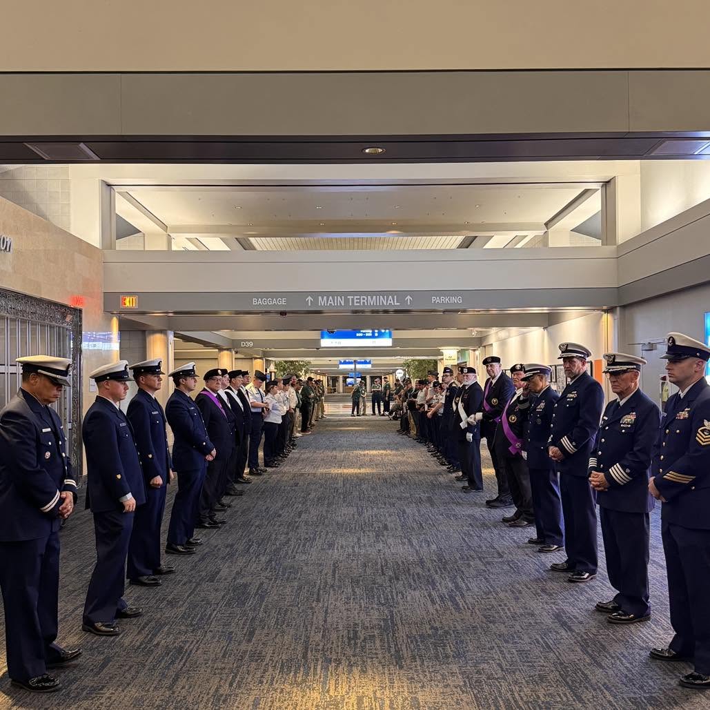 A corridor of honor welcomes the veterans home.