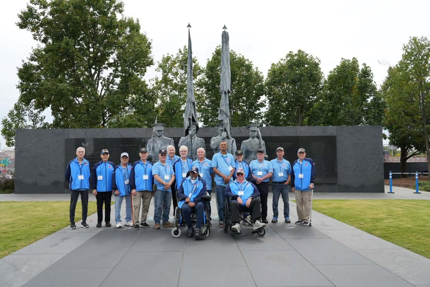 Bravo veterans together at the Air Force Memorial’s Honor Guard statue.