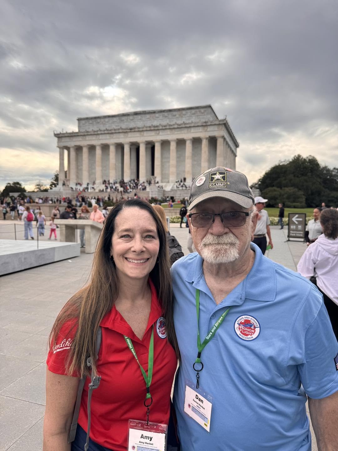 A veteran and guardian with the Lincoln Memorial behind them.