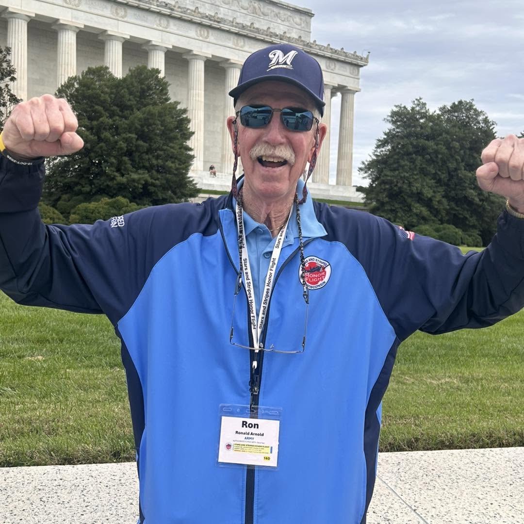 An Alpha veteran celebrates a memorable stop at the Lincoln Memorial.